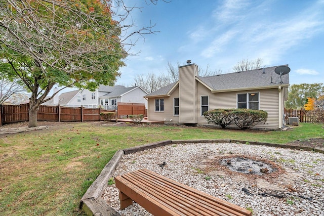 5209 Meadowbrook St, Plainfield, IL 60586 - rear view of property with a chimney