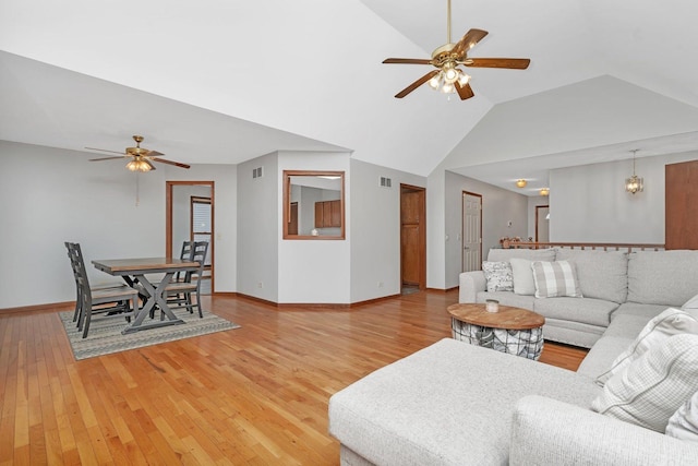 5209 Meadowbrook St, Plainfield, IL 60586 - living room with ceiling fan, light wood-style flooring, and vaulted ceiling