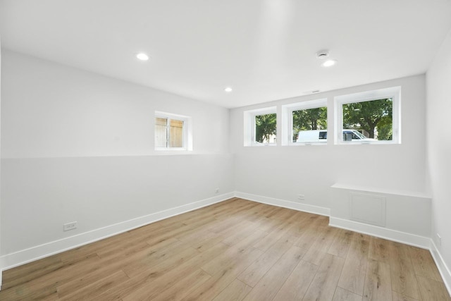 4630 N Kasson Ave, Chicago, IL 60630 - spare room with light wood-style floors, recessed lighting, and a smoke detector