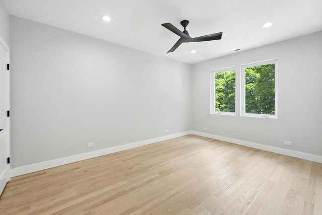 4630 N Kasson Ave, Chicago, IL 60630 - unfurnished room featuring a ceiling fan, light wood finished floors, and recessed lighting