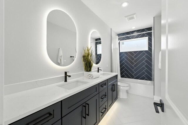 4630 N Kasson Ave, Chicago, IL 60630 - full bathroom with double vanity, washtub / shower combination, tile patterned floors, and recessed lighting