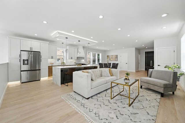 4630 N Kasson Ave, Chicago, IL 60630 - living area with recessed lighting and light wood finished floors