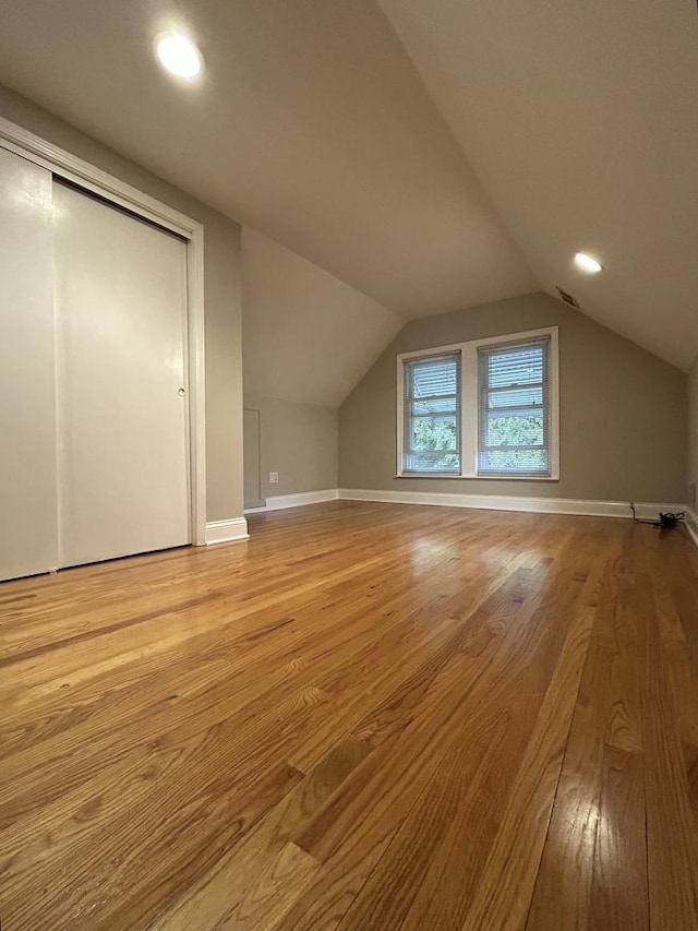 1636 N 75th Ave, Elmwood Park, IL 60707 - bonus room featuring lofted ceiling, wood finished floors, and recessed lighting
