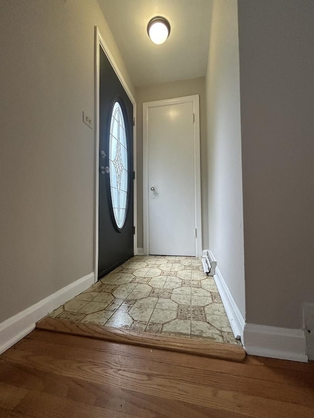 1636 N 75th Ave, Elmwood Park, IL 60707 - entryway featuring wood finished floors and baseboard heating