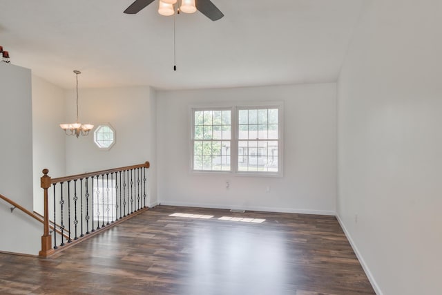 1409 N Nixon Dr, Pontiac, IL 61764 - spare room with wood finished floors, a chandelier, and ceiling fan