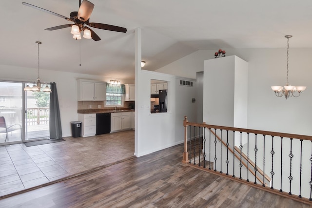 1409 N Nixon Dr, Pontiac, IL 61764 - kitchen featuring black appliances, a chandelier, vaulted ceiling, dark wood-type flooring, and ceiling fan