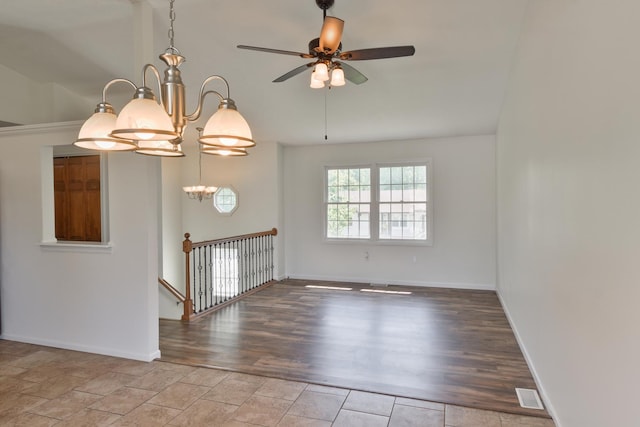 1409 N Nixon Dr, Pontiac, IL 61764 - unfurnished room with a chandelier, ceiling fan, lofted ceiling, and wood finished floors