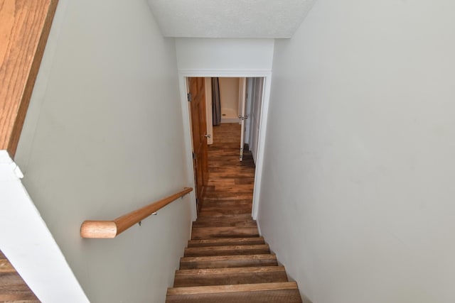 1409 N Nixon Dr, Pontiac, IL 61764 - stairs featuring wood finished floors and a textured ceiling