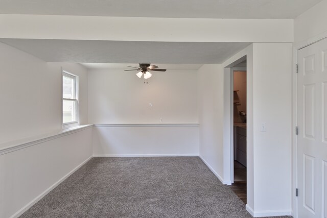1409 N Nixon Dr, Pontiac, IL 61764 - carpeted empty room featuring a ceiling fan and baseboards