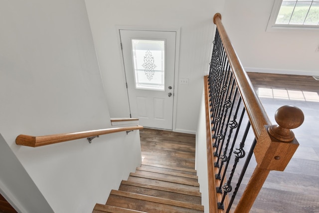 1409 N Nixon Dr, Pontiac, IL 61764 - stairs featuring baseboards and wood finished floors