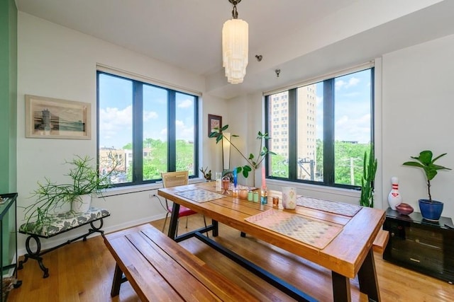 3232 N Halsted St Unit D412, Chicago, IL 60657 - dining space featuring light wood-style floors