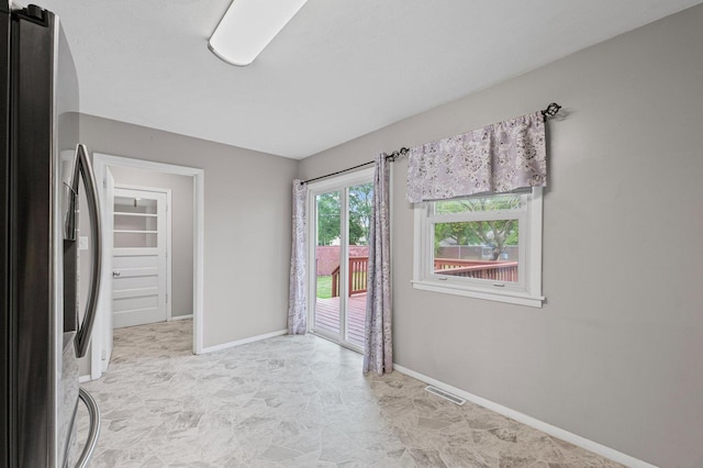 809 S Longview Rd, Monticello, IL 61856 - spare room featuring baseboards