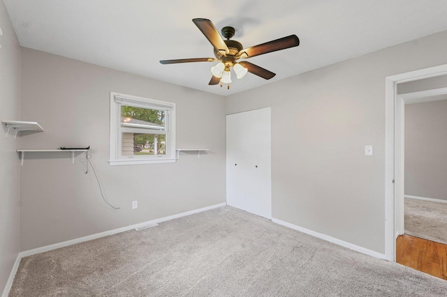 809 S Longview Rd, Monticello, IL 61856 - unfurnished bedroom with carpet flooring and ceiling fan