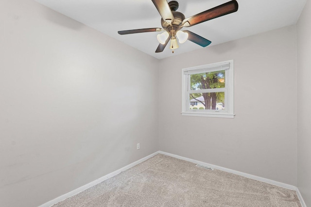 809 S Longview Rd, Monticello, IL 61856 - carpeted empty room featuring baseboards and a ceiling fan
