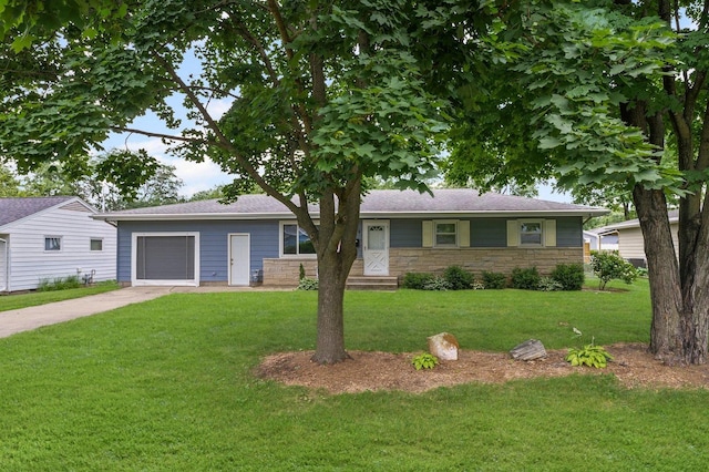809 S Longview Rd, Monticello, IL 61856 - single story home featuring concrete driveway, a front yard, and stone siding
