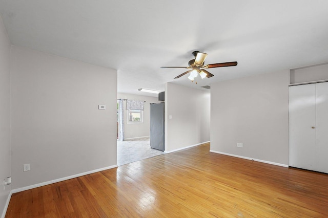 809 S Longview Rd, Monticello, IL 61856 - spare room with ceiling fan and light wood-style floors
