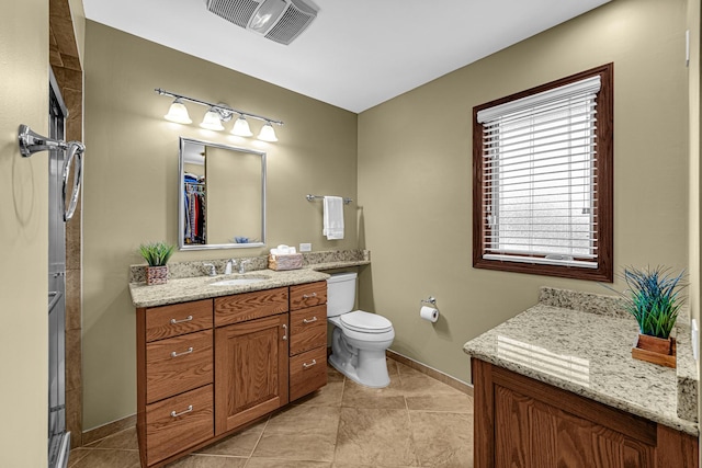8353 Arrowhead Ln, Orland Park, IL 60462 - full bathroom with vanity, a shower stall, and tile patterned flooring