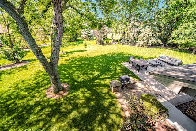 8353 Arrowhead Ln, Orland Park, IL 60462 - view of grassy yard with a patio area