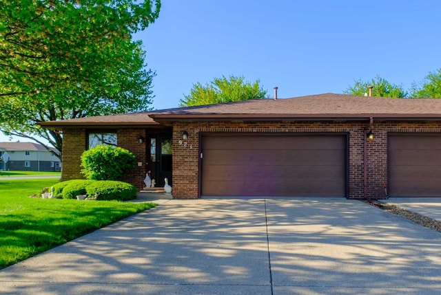 921 Shagbark Rd Unit 921, New Lenox, IL 60451 - single story home featuring driveway, an attached garage, brick siding, and a front yard