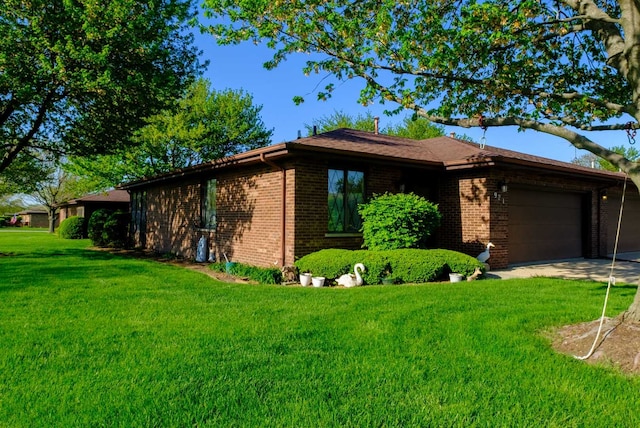 921 Shagbark Rd Unit 921, New Lenox, IL 60451 - view of property exterior with brick siding, a garage, a lawn, and concrete driveway