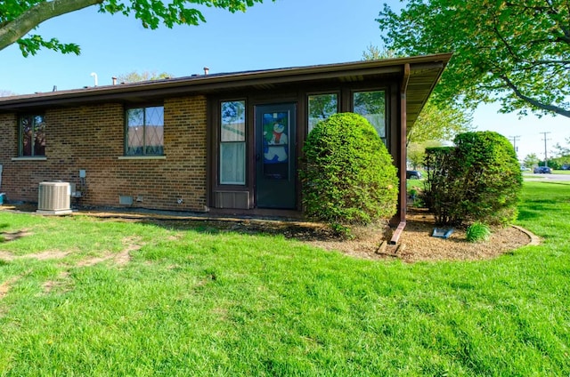 921 Shagbark Rd Unit 921, New Lenox, IL 60451 - property entrance with a lawn and brick siding