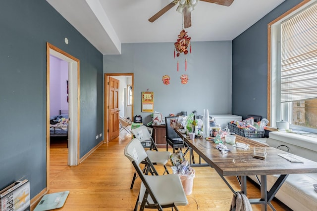2958 S Lowe Ave, Chicago, IL 60616 - dining room featuring a ceiling fan and light wood-style flooring
