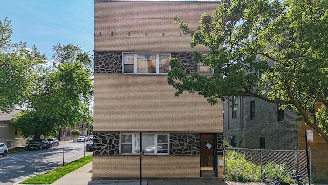 2958 S Lowe Ave, Chicago, IL 60616 - tudor house with brick siding and stone siding