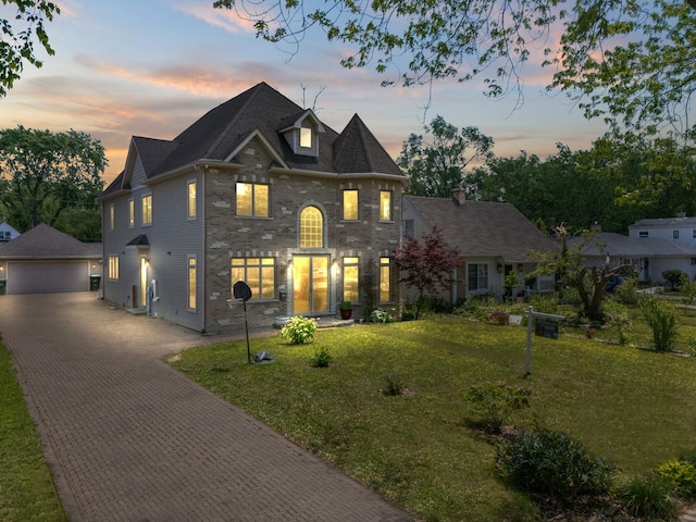 23 S Elm St, Palatine, IL 60067 - view of front facade featuring an outbuilding, a garage, and a lawn