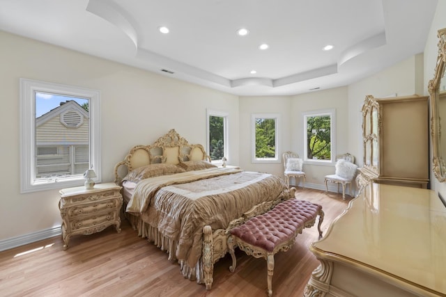 23 S Elm St, Palatine, IL 60067 - bedroom with a tray ceiling, light wood finished floors, and recessed lighting