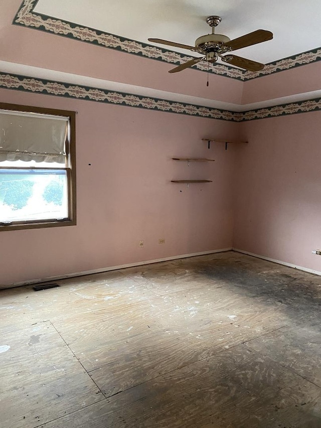 17212 Cottage Ct, Tinley Park, IL 60487 - spare room featuring a ceiling fan and baseboards