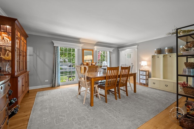 302 Carriage Hill Rd, Naperville, IL 60565 - dining room with wood finished floors and crown molding