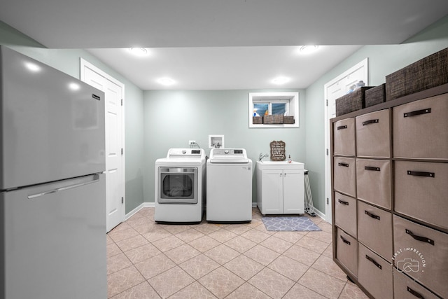 302 Carriage Hill Rd, Naperville, IL 60565 - washroom with cabinet space, washer and clothes dryer, light tile patterned flooring, and recessed lighting