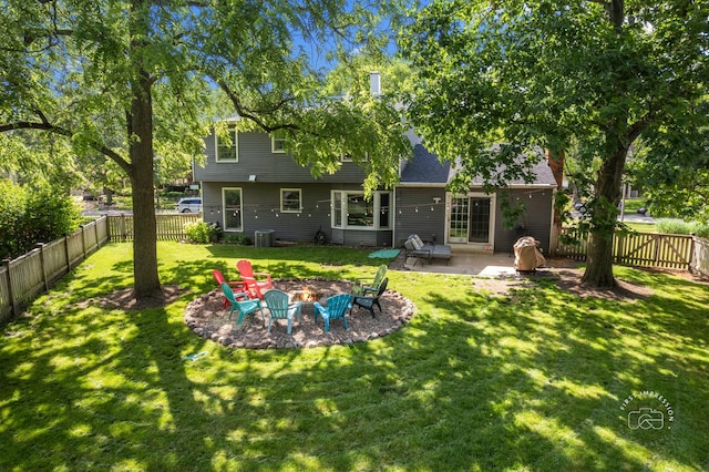 302 Carriage Hill Rd, Naperville, IL 60565 - rear view of property featuring a fenced backyard, a patio, and a fire pit