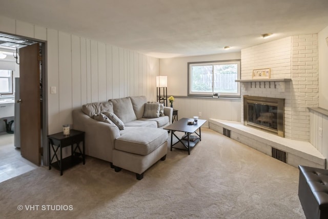 1942 Trail Ridge St, Arlington Heights, IL 60004 - carpeted living area with a brick fireplace