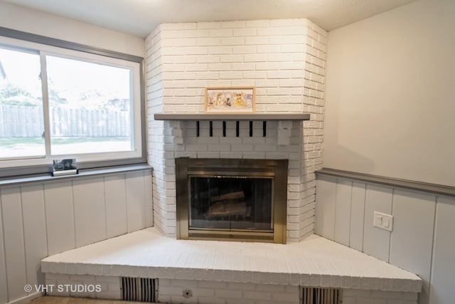 1942 Trail Ridge St, Arlington Heights, IL 60004 - detailed view of a brick fireplace and wainscoting
