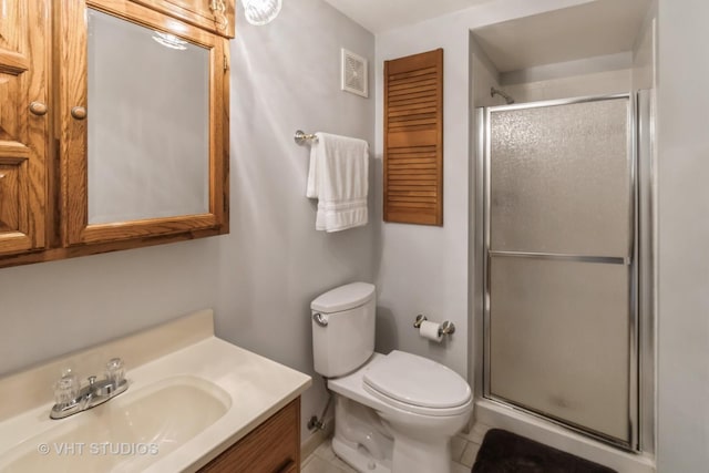 1942 Trail Ridge St, Arlington Heights, IL 60004 - bathroom with a shower stall, vanity, and tile patterned floors