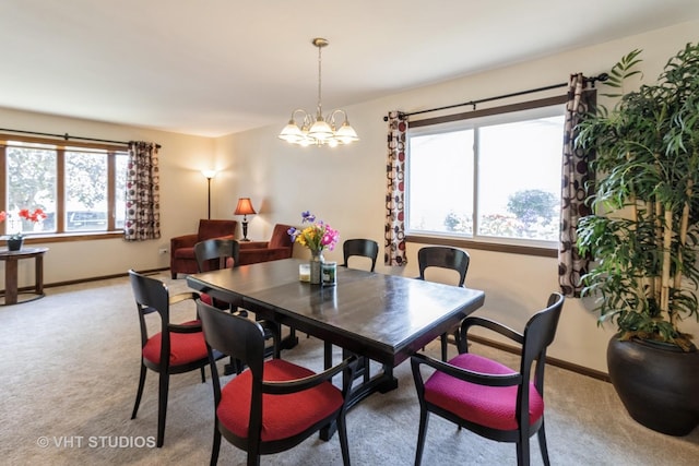 1942 Trail Ridge St, Arlington Heights, IL 60004 - dining space featuring light carpet and a chandelier