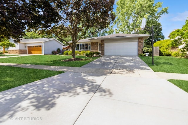 1942 Trail Ridge St, Arlington Heights, IL 60004 - view of front of property featuring a front yard, brick siding, and an attached garage