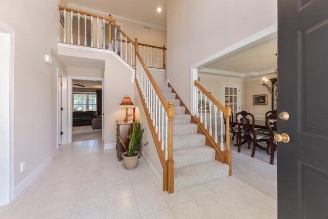 605 Ironwood Cc Dr, Normal, IL 61761 - tiled foyer entrance featuring stairway, a chandelier, crown molding, and recessed lighting