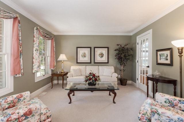 605 Ironwood Cc Dr, Normal, IL 61761 - living area featuring healthy amount of natural light, carpet floors, and ornamental molding