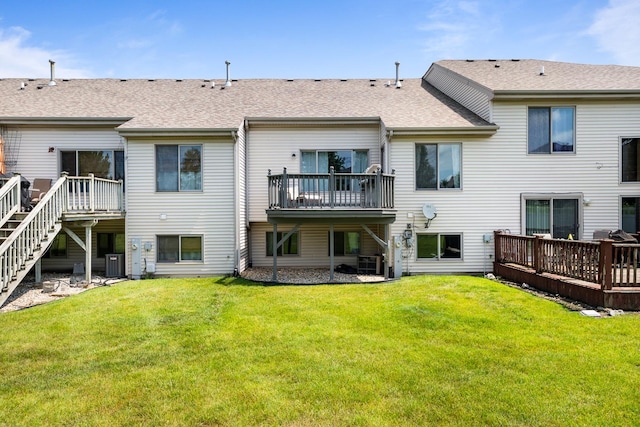 8331 W Chestnut Ct, Frankfort, IL 60423 - back of house with a deck, roof with shingles, and a yard