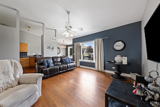 8331 W Chestnut Ct, Frankfort, IL 60423 - living area featuring ceiling fan, wood finished floors, and lofted ceiling