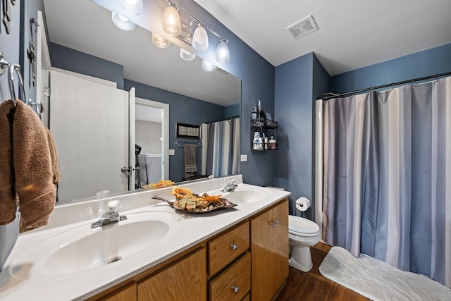 8331 W Chestnut Ct, Frankfort, IL 60423 - bathroom with double vanity, wood finished floors, and a shower with curtain
