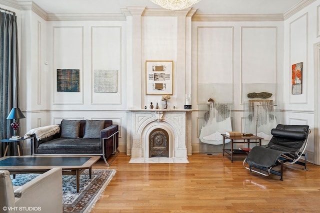 2249 W Warren Blvd, Chicago, IL 60612 - sitting room with a decorative wall, wood finished floors, and crown molding