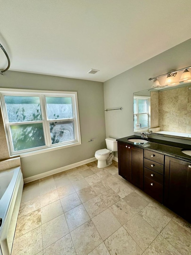6433 N Damen Ave Unit 3E, Chicago, IL 60645 - bathroom featuring vanity and a bath