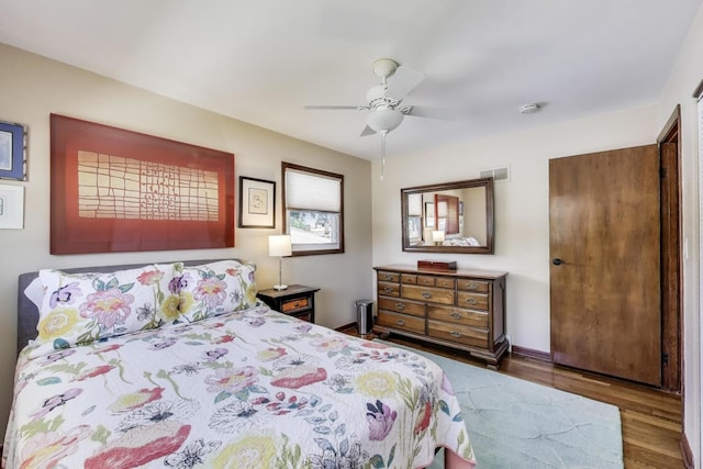 7203 W Lill St, Niles, IL 60714 - bedroom featuring wood finished floors and ceiling fan