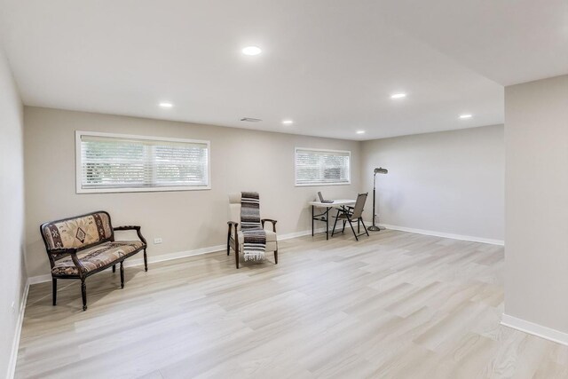 7203 W Lill St, Niles, IL 60714 - living area featuring light wood-type flooring and recessed lighting