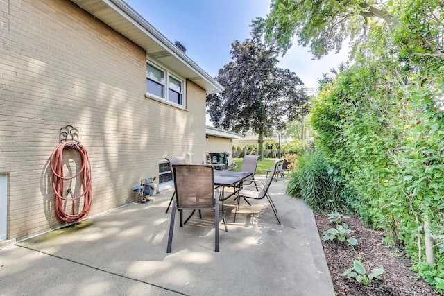 7203 W Lill St, Niles, IL 60714 - view of patio / terrace with outdoor dining area