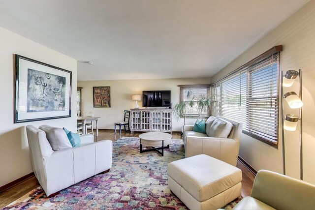7203 W Lill St, Niles, IL 60714 - living room with wood finished floors and baseboards