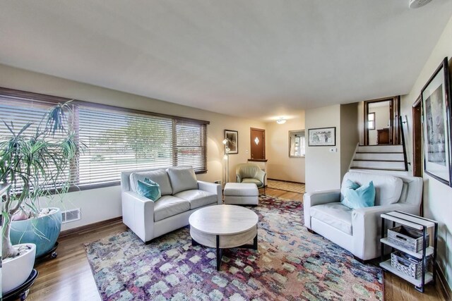 7203 W Lill St, Niles, IL 60714 - living area featuring wood finished floors and stairway